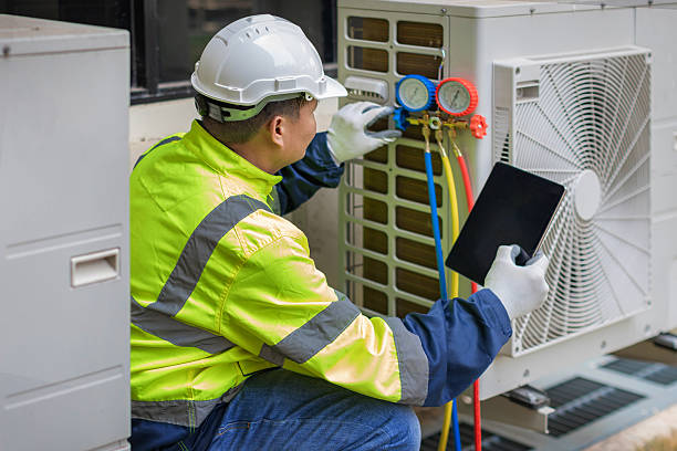 Professional Ac Installation technician working in Newton Center, MA